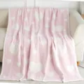 Cozy pink microfiber blanket with white hearts, soft texture detail shown on sofa, warm home decor. - White Pink Heart
