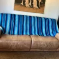 Blue striped Mexican woven blanket for sofa throw, beach, or picnic use with vibrant style. - Lake Blue