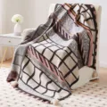 Knitted boho throw blanket for sofa and bed, geometric jacquard pattern with decorative tassels. - Pendant - Susuge