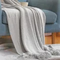 Gray knitted throw blanket with waffle texture and fringe for sofa, couch, and home decor. - 127*152+10*2cm Fringes - 580g / Pineapple Warp Knit - Light Grey