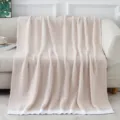 Soft fuzzy knitted blanket in beige, thick cozy throw for home decor and sofa warm use. - Soft Fluffy Blanket - Beige