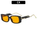 Modische schwarze eckige Sonnenbrille mit orangen Glaesern und goldenen welligen Buegeln C4. - Schwarzer Rahmen Orangefarbene Linse