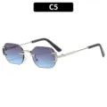 Gafas de sol poligonales sin montura con lentes degradadas azules y estructura de metal. - C5-Marco Plateado Lente Gris Azul