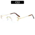 Elegantes gafas de sol poligonales sin montura con estructura metálica dorada y carey. - C12-Marco Dorado Lente Clara Puntas Leopardo