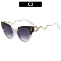 Dames mode kattenoog zonnebril met gouden slang pootjes, zwart wit montuur verlooplens. - C2-Zwart Wit Frame Grijze Verloop Lens