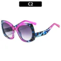 Gafas de sol de ojo de gato grandes para mujer, diseño bicolor moderno y protección solar. - Montura Floral Púrpura Lente Doble Gris