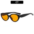Fashion cat eye sunglasses for women with trendy orange lenses, stylish summer eyewear. - Black Frame Orange Lens