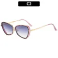 Elegantes gafas de sol de ojo de gato de metal con lentes degradadas y protección UV - Montura Floral Púrpura Lente Doble Gris