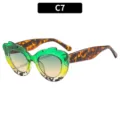 Occhiali da sole eleganti con sfumatura irregolare e stanghette tartarugate donna. - C7 Montatura Tartarugato Verde Giallo Lenti Blu Tè