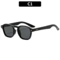 Gafas de sol negras informales estilo minimalista con remaches variante C1 accesorio. - Montura Negra Lente Gris