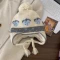 Cute strawberry jacquard knitted earflap hat with pompom and thick plush lining for winter. - White