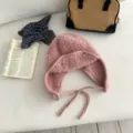 Cozy fluffy pink plush trapper hat for women, autumn and winter warm knitted earflap cap. - Pink