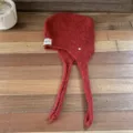 Red knitted earflap beanie winter warm wool hat with braided long side straps and button detail. - One Size / Red