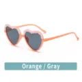 Kids heart sunglasses with cute flower applique, orange frame and grey lens for children. - Vibrant Orange