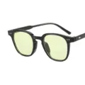 Trendy black frame sunglasses with light green lenses, perfect for daily street fashion. - Glossy Black Yellow Lens