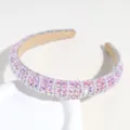 Sparkling pink rhinestone and pearl headband detail, showing exquisite handcrafted crystal texture. - Pink