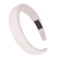 Detail shot of the minimalist wide padded fabric headband for women daily hair styling. - Thickened Wide Style (FV04) / Beige