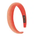 Closeup detail view of a coral orange velvet padded headband showcasing soft fabric and tag. - Thickened Wide Style (FV04) / Orange Velvet