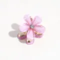 Close-up of a cute mini pink flower hair claw clip with rhinestone center and gold metallic base. - Deep Pink