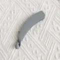 Detailed view of the elegant grey matte banana hair clip, stylish hair accessory for daily wear. - Regular Fit / Gray