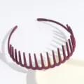 Detailed view of the purple plastic hair hoop with teeth, offering a secure and stylish non-slip grip. - Burgundy