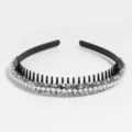 Detail view of pearl rhinestone hair hoop with teeth, elegant black plastic headband accessory. - Silver