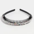 Detailed view of the pearl rhinestone headband with teeth, showcasing sparkling colorful crystal details. - Colorful