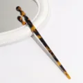 Acetate hair pin detail view showing vintage leopard print elegant hair accessory design. - Black Brown