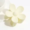 Cute pastel yellow matte flower hair claw clip for women and girls, sweet styling hair accessory. - Off White