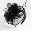 Black mesh feather fascinator headband detail view, elegant court style party hair accessory. - Black Veil Feather