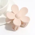 Matte pink flower hair claw clip close up, cute floral hair accessory for daily styling. - Nude
