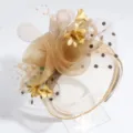 Elegant wedding banquet hair hoop detailed view showing gold mesh flowers and pearl accents. - Champagne Floral Veil