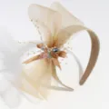 Elegant champagne mesh bow headband with sparkling crystals and faux pearls for party wear. - Large Bow Brown
