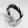 Elegant black feather fascinator headband with vintage mesh veil for party and banquet wear. - Black