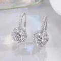 Classic silver moissanite halo leverback earrings featuring brilliant round center stones. - Moissanite (B009B1000Y00) / 1 ct / White Gold