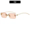 Gafas de sol sin montura rosas con marco de metal dorado y detalles de estrellas. - Estilo C2 / Montura Dorada Lente Marrón