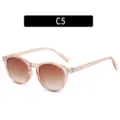 Stijlvolle retro ronde zonnebril met verlooplenzen, trendy T-design voor heren op straat. - Champagne Montuur Bruine Lens
