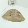 Detailed view of the breathable knit bucket hat showcasing hollow diamond and cable textures. - M (56-58cm) / Khaki