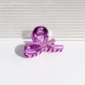Lila metallische Haarklammer, stilvolles Schleifen-Design Mini-Haaraccessoire für tägliches Styling. - Kreuz Lila