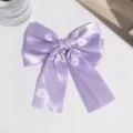 Elegant light purple satin bow hair clip with long ribbons for women and girls daily wear. - Light Purple