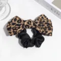 Leopard print bow hair scrunchie detail view, elegant retro hair accessory for women and girls. - Leopard Scrunchie