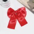 Red satin bow hair clip for women, elegant ribbon hair accessory with duckbill clip for daily wear. - Red