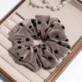 Brown velvet polka dot scrunchie detail shot, elegant plush hair tie accessory for women. - Red Brown