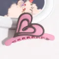 Graziosa molletta per capelli a cuore rosa con bordo grigio scuro, ideale per look quotidiani. - Stile Cuore / Rosso rosa