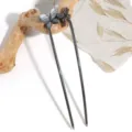 Detailed view of dark metal U-shaped hair fork with crystal butterfly and rhinestone flower. - Butterfly Flower Rhinestone Style (5901318942434)