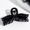 Pinza de pelo negra con lazo para mujer, accesorio elegante y brillante minimalista detalle. - Forma de lazo / Negro