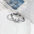Zilveren metalen haarklem met onregelmatig wolkenontwerp, chique minimalistisch haaraccessoire. - Zilveren Wolk Stijl
