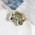Gouden metalen haarclip haarklem voor vrouwen, stijlvolle geometrische vlinder haaraccessoire. - Strik Stijl (24110918) / Gouden Strik
