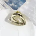 Gouden geometrische driehoek haarclip voor vrouwen, stijlvol metalen haaraccessoire voor dagelijks. - Driehoek Stijl (24110918) / Gouden Driehoek