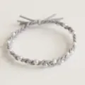 Detailed close-up of the grey braided hair rope adorned with elegant white faux pearls for women. - Pearl Gray